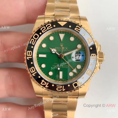  Replica Rolex GMT Master II Swiss ETA 2836 Yellow Gold Green Dial Watch